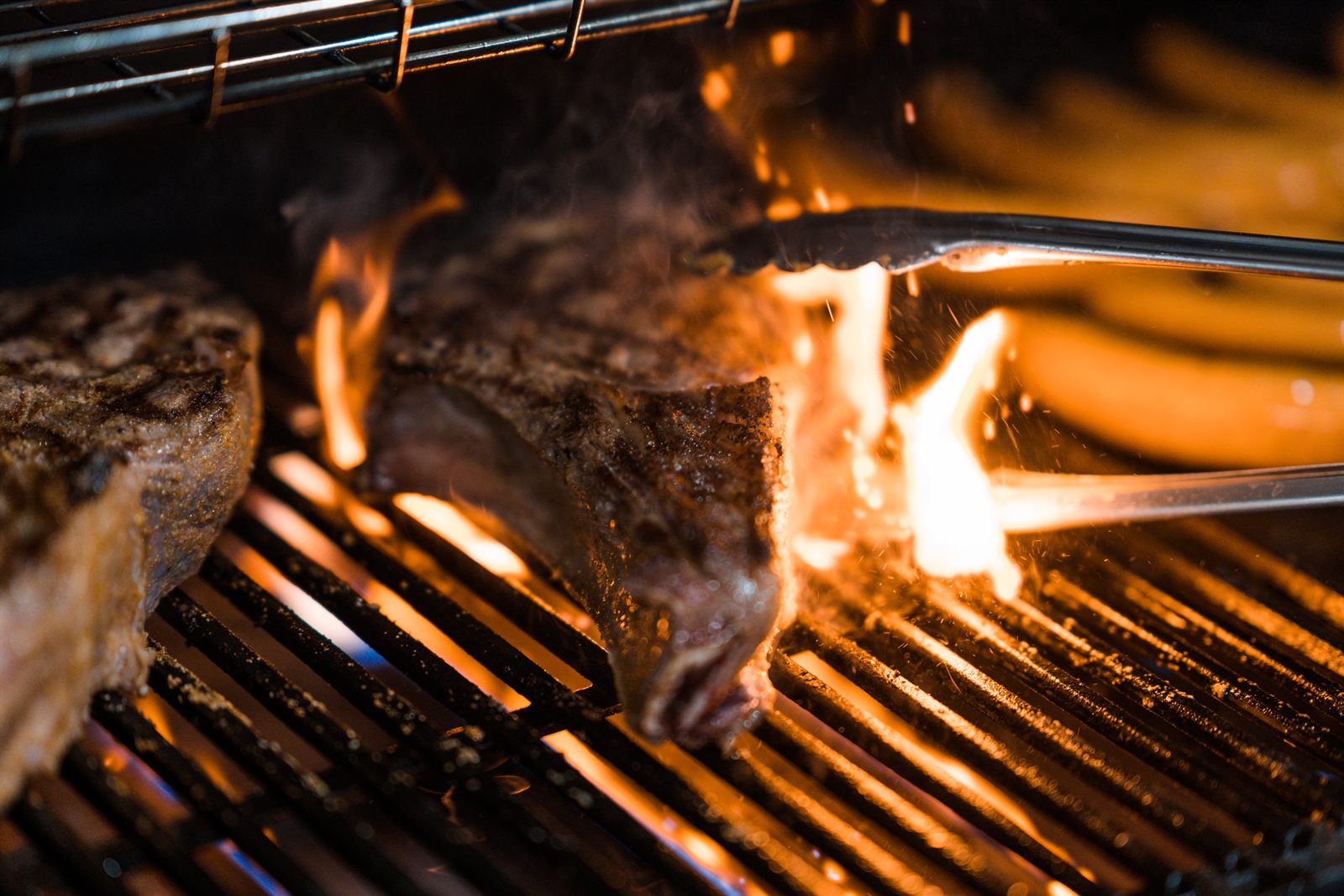 Sunday Roast BBQ chef grilling over live fire for premium BBQ catering in Singapore